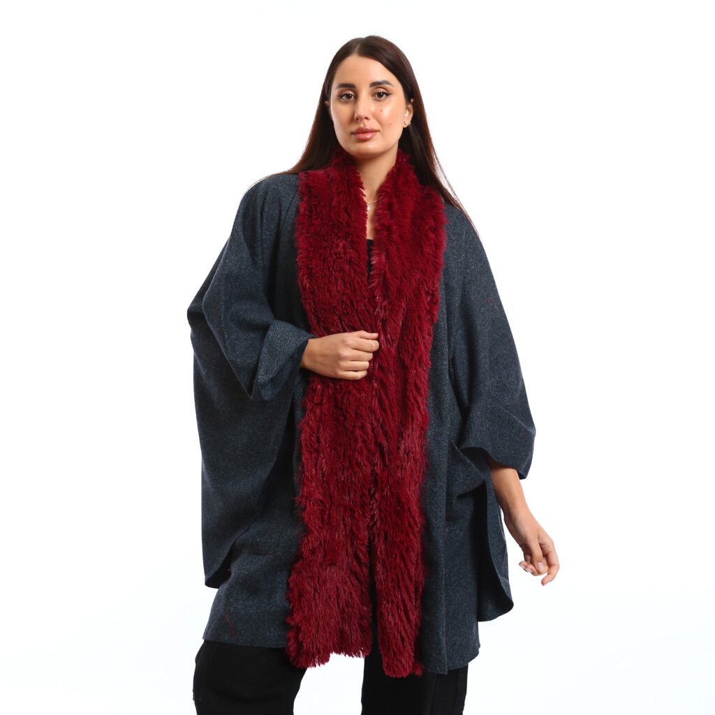 Elegant winter look featuring a Navy oversized Cap with wide sleeves, the deep burgundy faux-fur scarf adds warmth, texture and pocket patch