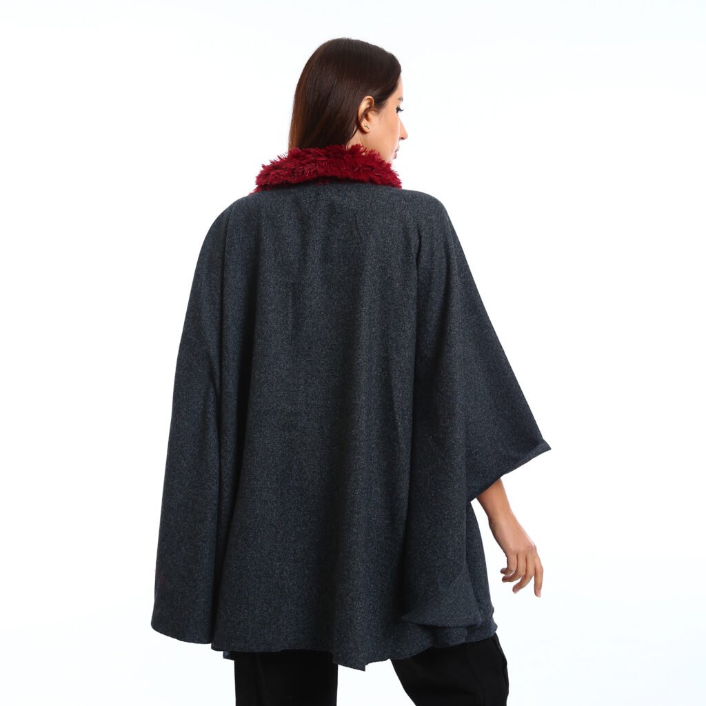 Elegant winter look featuring a Navy oversized Cap with wide sleeves, the deep burgundy faux-fur scarf adds warmth, texture and pocket patch