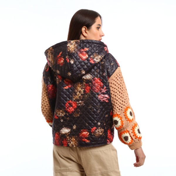 Hooded Puffer Jackets with unique, handcrafted elements like crochet sleeves oversized, chunky knit (crocheted) sleeves in shades of brown,