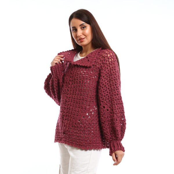 Handcrafted crocheted pullover in a rich burgundy tone. It features an open, textured stitch relaxed sleeves with slightly flared cuffs and a wide