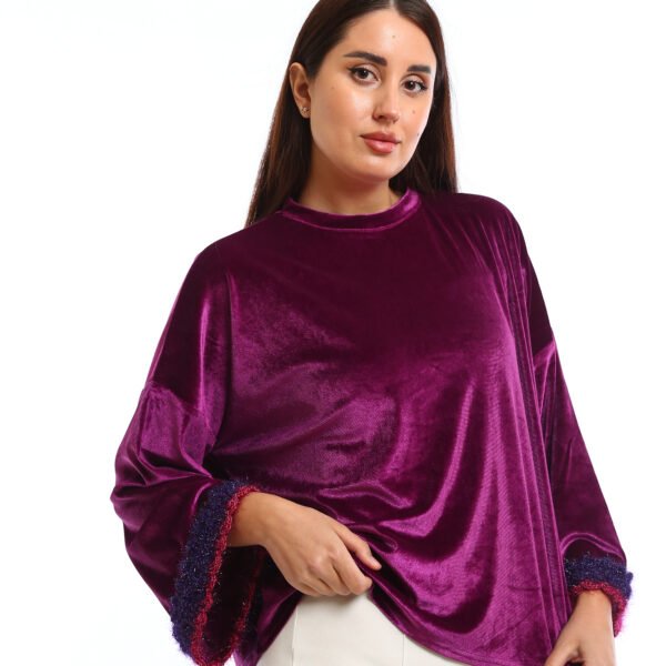 An elegant and luxurious look.. loose-fit,   Basic top a velvet  The fabric has a soft, plush texture with a subtle sheen