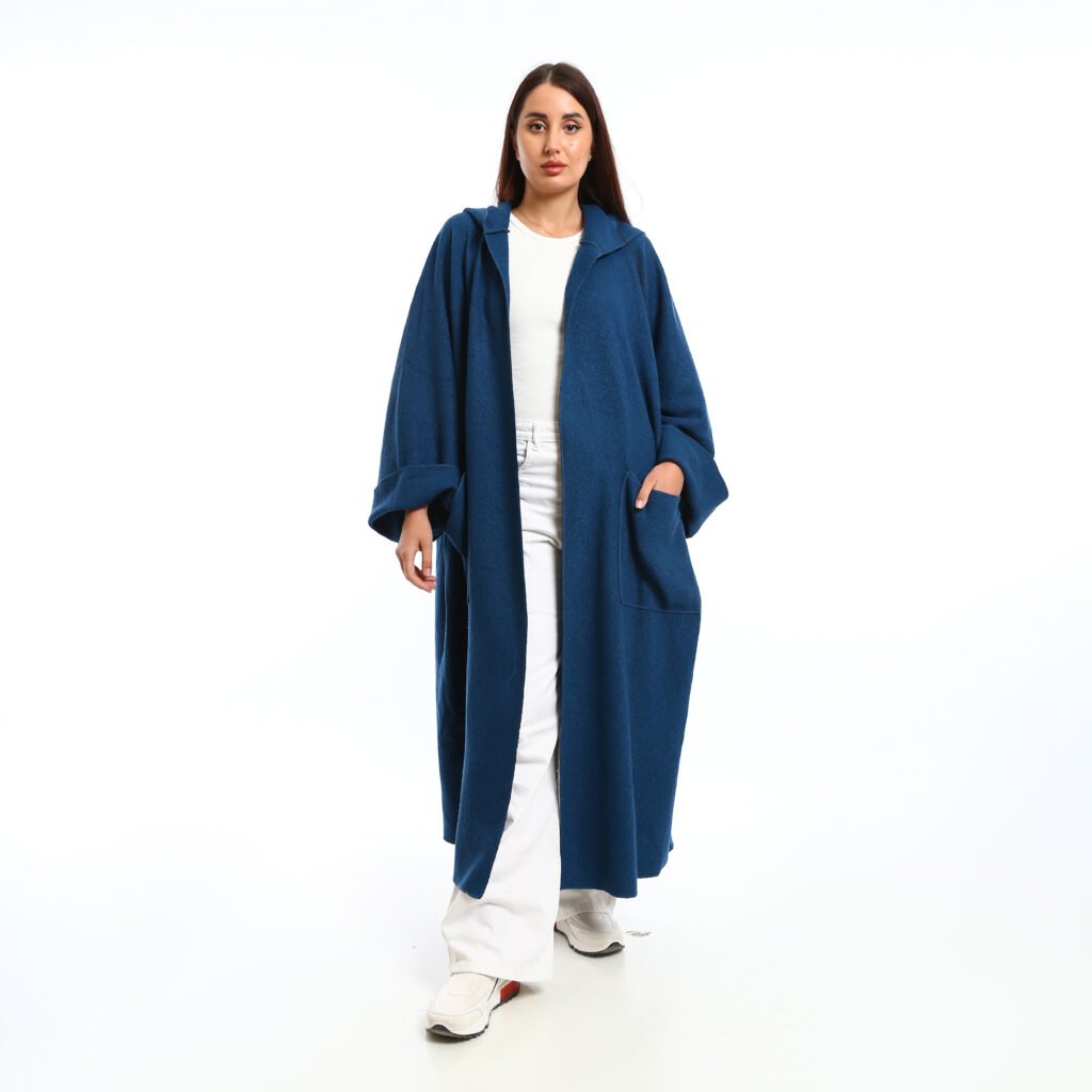 A long oversized hooded wool cardigan at front patch pockets