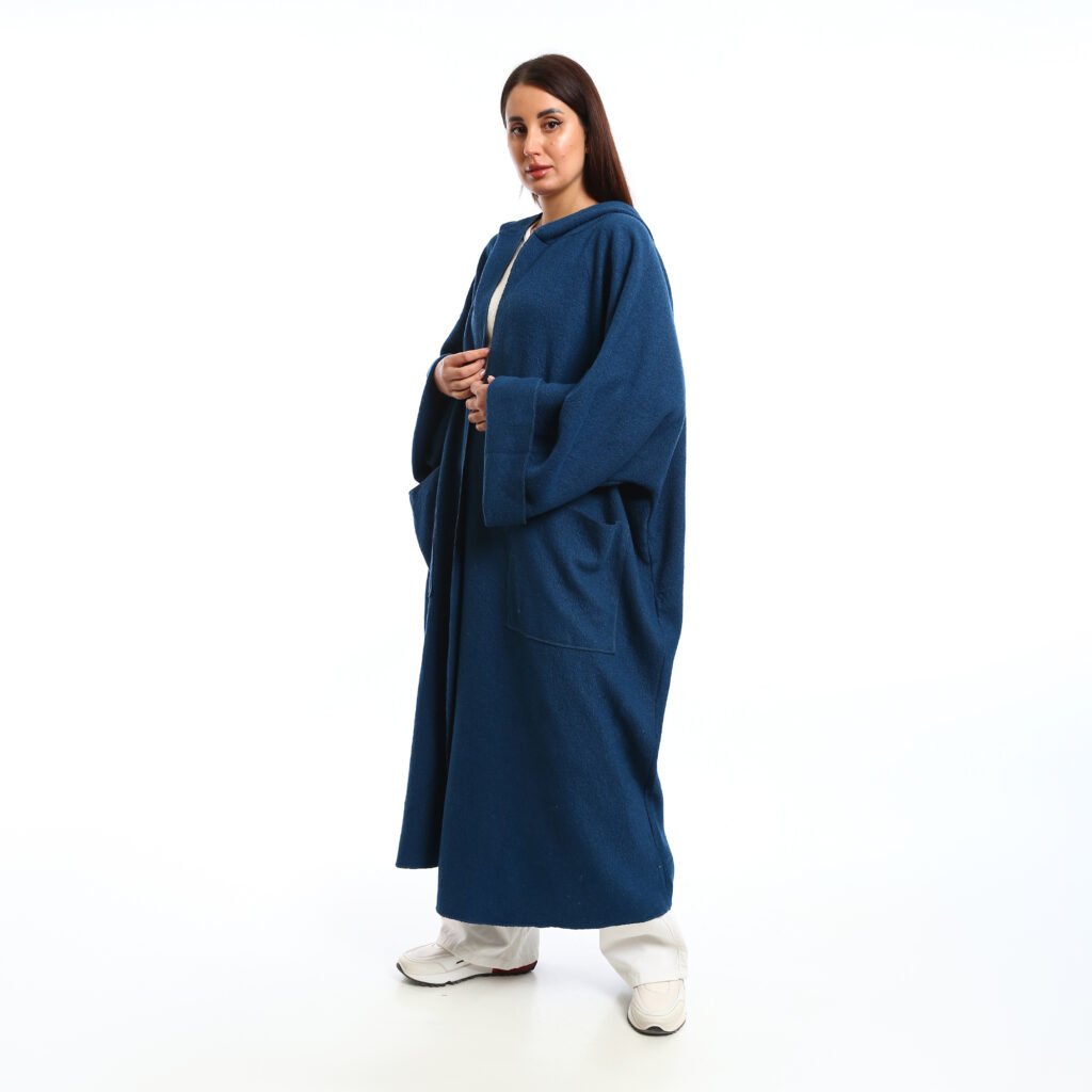 A long oversized hooded wool cardigan at front patch pockets