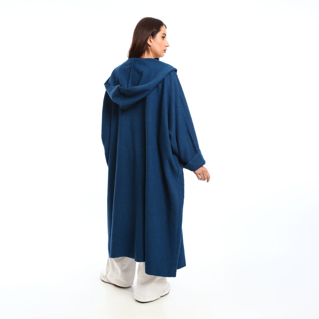 A long oversized hooded wool cardigan at front patch pockets